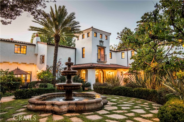 909 Via Coronel Palos Verdes Estates, California Back in the 1920’s, 1 of the peninsula’s 1st developers chose these extraordinary 3.17 acres to build their dream home. Reconstructed & expanded in 2006, the home retains its Spanish Revival style & historic charm, but it has been completely renovated to accommodate the needs of today’s modern family (including a 3-stop elevator & a natural gas powered generator). With commanding ocean views & surrounded by majestic trees a gated entrance is your 1st introduction to the home. A private tennis court borders the wide driveway & leads to the tranquil courtyard w/ traditional Spanish fountain & 2 rm guest house. Most rooms in the home enjoy expansive ocean views. From the astonishing living rm, to the incredible family rm & gourmet kitchen, the main flr opens out to the expansive veranda, the sweeping lawn area, a refreshing pool & an outdoor kitchen area. Upstairs, you’ll discover oversized, ocean facing bdrms designed to start & end your days w/ grace. Select your favorite from the 600 bottle wine rm, treat yourself to a movie in your own 9-seat theater, or practice your stroke on your private putting green. Relax in front of one of the 7 fireplaces, or recharge in the sauna or steam rm. Car buffs will enjoy the 5-car garage. Amenities are aplenty here, so take your time and enjoy each one. History aside, this is one of those special homes...and a once in a generation opportunity.