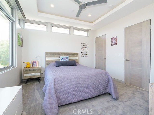 2nd  bedroom with treetop views.