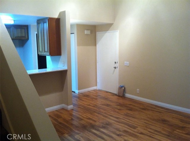 Note stairs to loft bedroom on the left.  Main floor bedroom is behind the kitchen.