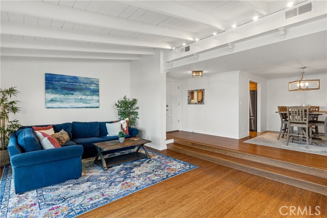 Step-down living room is open to dining - great for entertaining.
