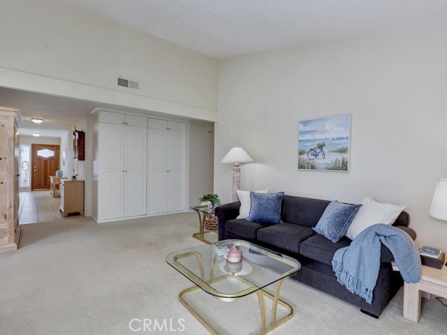 Large storage closets in hallway off family room