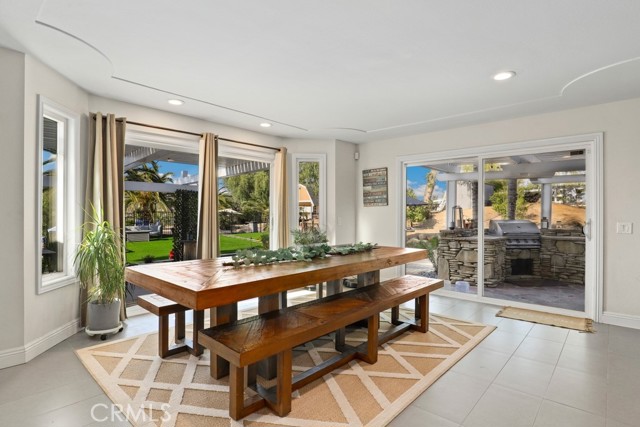 This dining area opens to the ourdoor, built in BBQ