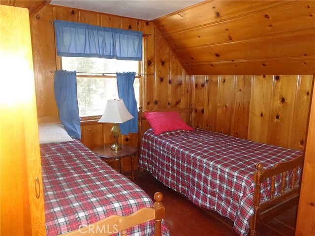 Bedroom top right of stairs