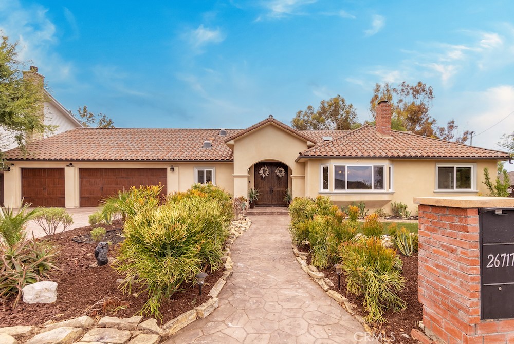 Welcome to this beautifully remodeled, turnkey home in the charming equestrian neighborhood of Westfield in Palos Verdes Peninsula. This 3 bedroom, 2.75 bathroom, 2,621 square-foot home was custom remodeled in 2013-2014 using the finest quality materials and attention to detail. Enter through the double 8-foot-tall designer speakeasy doors into the home’s open-concept great room. With vaulted ceilings, floor-to-ceiling windows, multiple skylights, and glass-panel French doors, natural light floods through this breezy space, designed for entertaining and ultimate enjoyment. 
  
The upgraded kitchen extends from the great room, with a peninsula countertop, bar seating and impressive granite counter space. High-end appliances include a Bosche dishwasher, Viking stove, and “Instaview” LG refrigerator, which lets you see inside by knocking on the door. The kitchen also includes a walk-in pantry, soft-close cabinetry, and convenient access to the 3-car garage.
 
Enjoy sunny So Cal indoor-outdoor living with tall French glass doors that open from the great room onto the expansive rear deck, overlooking the multi-tiered lot with mature pepper trees and horse ring below. The private ipe wood deck is also accessible from the master suite, the living room, and the second bedroom.
 
The large master bedroom features high vaulted ceilings, a large walk-in closet, and a custom bathroom with marble countertops, walk-in shower, Brizo fixtures and 2-person soaking tub.

Luxury finishings throughout the home also include custom interior doors with high end Emtek door handles and locks. In the spacious second bedroom, there is a walk-in closet, French doors to the patio, and vaulted ceilings. Sophisticated details continue with features like marble in the second and third bathrooms, one with a walk-in shower, and the other with a jetted spa tub. 

An optional neighborhood HOA (dues are voluntary) produces fun block party events, and there are community tennis courts that you can enjoy. 
 
Dual zoned central air-conditioning and heat, 2 tankless water heaters, 3-car garage, large finished attic, and putting green in the front yard are a few more of the features that make this luxury custom home extra special. Come join us for a private viewing!