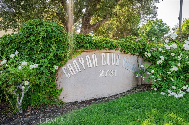 Built in Equity! Appraised at $435,000. Highly sought after unit in the private Canyon Club Villas gated community. The entire unit has been tastefully upgraded from the foundation up. Spacious floor plan with recessed lighting and wood flooring throughout. Move-in ready or use as great income property.  Open kitchen with matching stainless steel appliances and plenty of cabinet space. The living room boasts a great gas fireplace and large sliding doors which open up to a private outdoor patio. The primary bedroom has a custom built-in closet system which will keep your space organized and functional. Washer and dryer hookups are conveniently located next to the full bathroom. This unit comes with a one car garage and an additional parking space. Canyon Club Villas offers a large swimming pool/spa and beautifully maintained grounds of mature landscaping and pathways throughout. There is so much to enjoy!