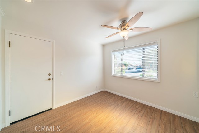 Dining area, adjacent to kitchen and garage door.