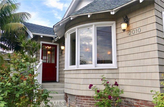 2010 Bayview Drive Hermosa Beach, California This classic Craftsman Beach Home runs street to alley and is located in the most highly sought after neighborhood in Hermosa Beach. This is a warm and inviting home that was extensively remodeled in 2009. Hardwood floors run throughout, marble counters, and stainless appliances including Meile dishwasher and 6 burner Viking gas range... meticulously designed with no expense spared. Formal living and dining room with built-in vintage buffet and bookcases, french doors, glass knobs, crown molding, and coved ceilings... no detail overlooked. The ocean-view master suite offers a walk-in closet, large marble shower & jetted tub wet room. Other luxurious mentionables include an entertaining outdoor living area, outdoor hot/cold shower, and a large 2 car garage. Just 2 stop signs to the sand, and a fun walk to downtown, shops, and restaurants. This is the life... this is Hermosa! Come and see the original, non-cookie cutter beach home you've been seeking!