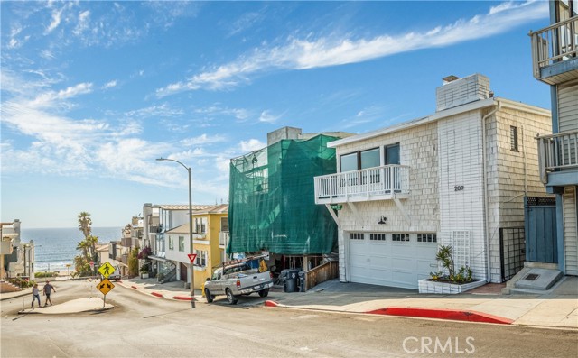 8 houses down the street to the Strand