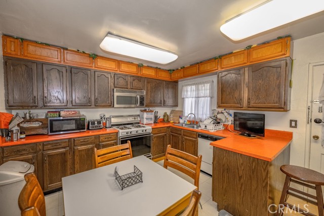 Kitchen  gas stove; side door to yard