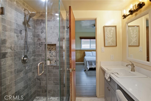 Alternate view of hall bathroom showing off the new tile shower