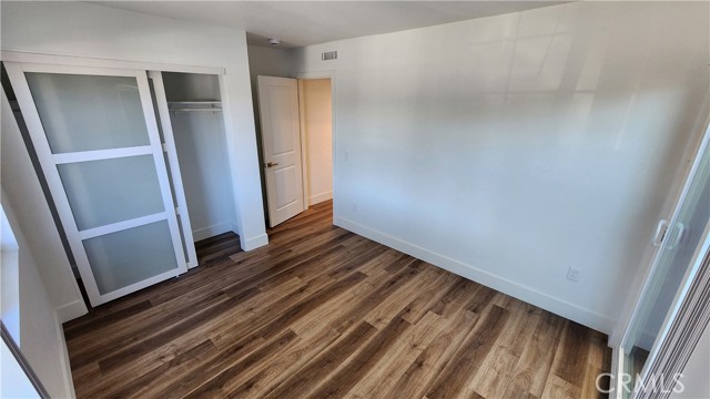 BR1 Downstairs - has slider to small fenced yard with separate gate to the front.