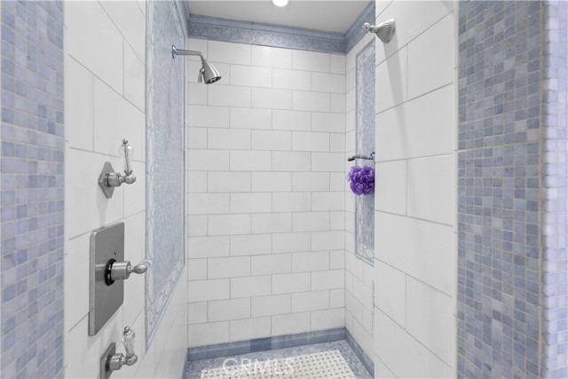 primary bath with walk in shower. dual shower heads