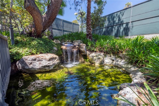 Beautiful garden waterfalls provide enhanced ambient tranquility.