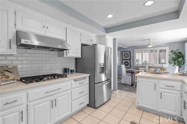 White Kitchen with stainless appliances