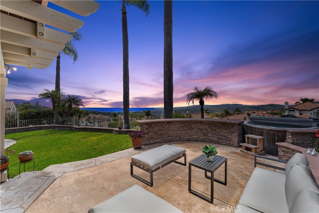 VIEWS!!! VIEWS!!! VIEWS!!! Set on a quiet, single-loaded street in the hills of Rancho San Clemente, this expansive residence offers some of the most breathtaking panoramic views in the area—including the ocean, Catalina Island, rolling hills, and unforgettable sunsets. With the largest floorplan in the community, this home provides plenty of space for the whole family to live, work, and relax in comfort.

Inside, you’ll find a bright and airy layout filled with natural light and soaring ceilings. The main level features a versatile bedroom and full bathroom—perfect for guests or multigenerational living—while upstairs includes three additional bedrooms, including a standout primary suite. Enjoy a private balcony with sweeping views, a cozy fireplace, and vaulted ceilings that create a sense of space and serenity.

The kitchen is open and functional with a charming breakfast nook, flowing seamlessly into the family room with fireplace. A formal dining room sits adjacent to the living room, offering ideal spaces for both casual and formal gatherings.

Step outside to a spacious backyard that feels like a private retreat, complete with a partially covered patio, elegant stacked stone hardscape, a relaxing spa, and those stunning views you’ll never tire of. The home also includes a water filtration and water software system, adding comfort and quality to everyday living.

Practical features include a 3-car garage, generous driveway, low HOA dues, and no Mello Roos. This ideal location is just minutes from San Clemente’s beautiful beaches and close to hiking and biking trails, Rancho SC Park, Lobos Elementary, Life Time Fitness, shopping, dining, and easy freeway access.

Don’t miss this opportunity—schedule your private showing today!