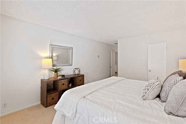 The primary suite is a spacious bedroom closet, and primary bath with dual vanities.