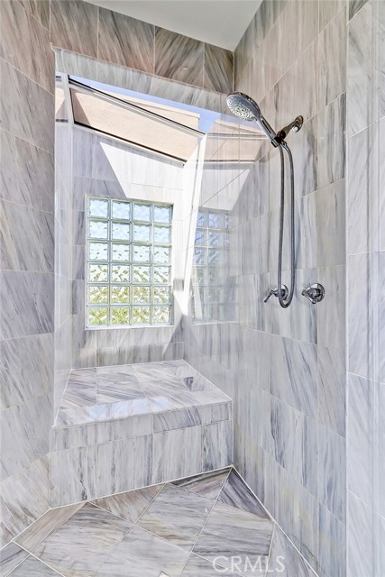 Marble enclave with shower bench