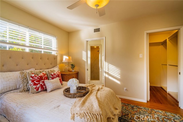 A master bathroom and walk-in closet.