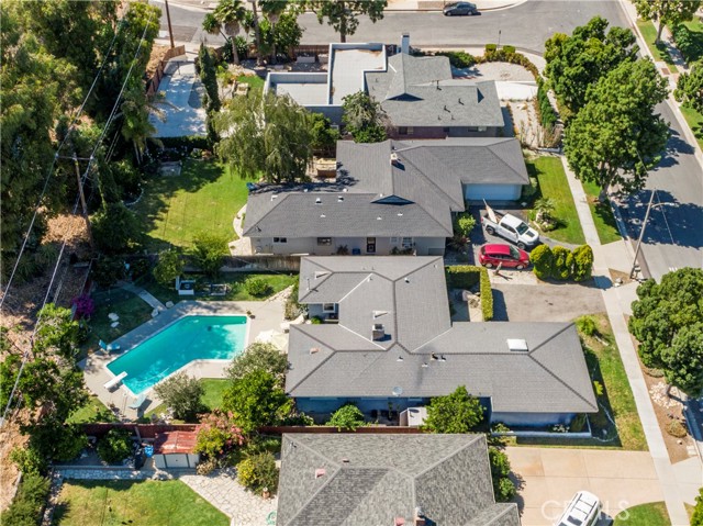 Aerial view of pool, backyard, house and front yard