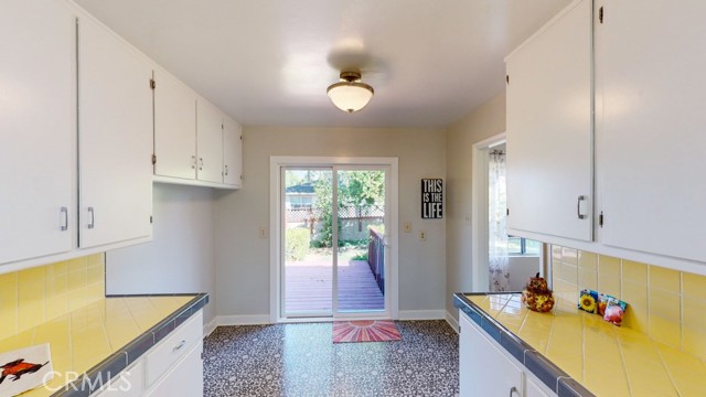 Breakfast nook or room for desk next to sliding door.