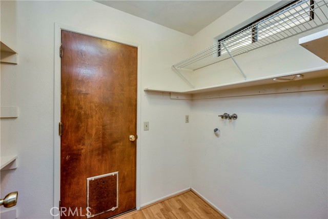 laundry room before garage off kitchen