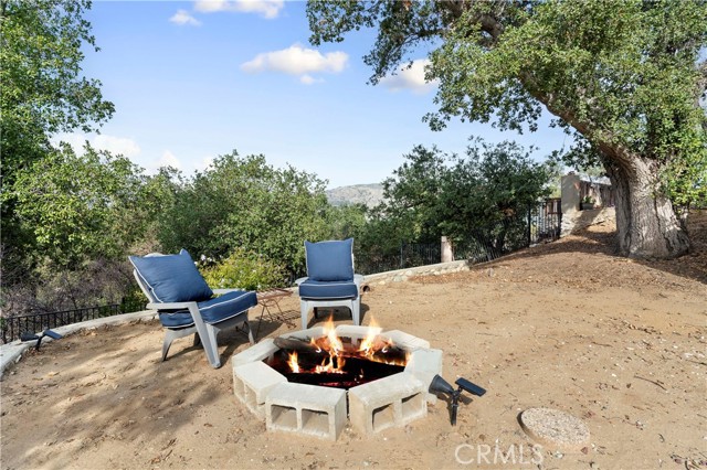 Large flat area down from pool towards front porch.