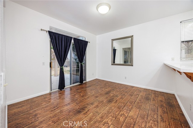 Dining area with sliding door to back patio and yard