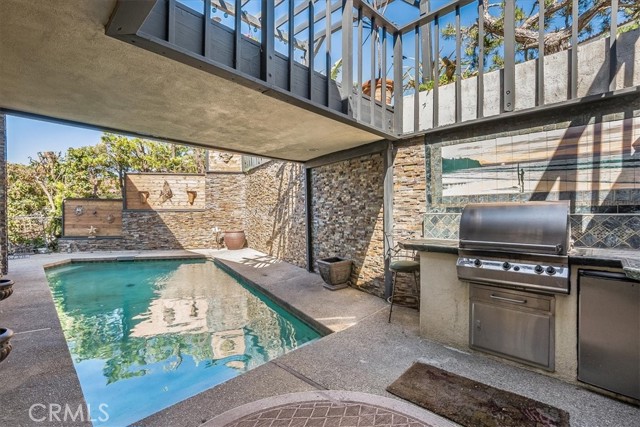 Pool with Built-in Grill off Family room