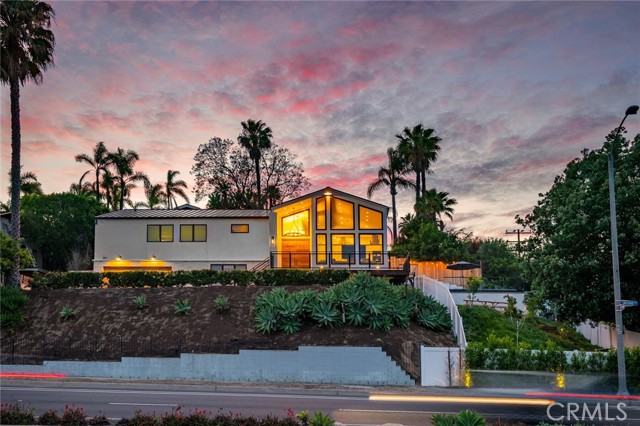 2141 Indian Springs Lane Newport Beach, California "Motivated Seller" Price Reduction! Check out instagram @indiansprings_newport-beachca . "Views Views" stunning fully remodeled 4 bed, 4 bath Newport Beach home with incredible views on a large approx 12,000 sq ft lot. Enjoy the site of the picturesque “Back Bay” from almost every window. This 3233sq ft home is located in a private community of Indian Springs and sits behind an automatic gate with push button access . It features an interior designed by the famed Erica Bryen and has been highlighted on her Instagram. No expense was spared on the extensive remodel and addition requiring new foundations and framing. The kitchen is equipped with Thermador Professional Series appliances, wine refrigerator, custom handmade Moroccan Tile, Neolith kitchen counters and waterfall Island, large built out pantry with barn door. Two large fireplaces located in the living room and great room are surrounded in beautiful limestone. As you walk through this gorgeous home you will find that every room has its own distinctive finishes. The unique selections in each bathroom showcase the time and money invested to make this a dream home. The primary bedroom’s remarkable bedside views include a spacious custom walk-in closet that provides ample room for shoes, clothing and accessories. Marble counters, custom tile backsplash, and white marble floor in the primary bath must be seen to be appreciated. The primary bath also features a massive shower with glass tile, two shower heads including a rain shower, Victoria and Albert modern free-standing tub, custom vanity and chandelier. All other bathrooms are custom with contemporary tile and countertops. You must walk the home to appreciate all the details that make this home unique and desirable. Other highlights; all cabinets were custom made, closets built by California Closets, downstairs bedroom is set up like a hotel suite with a large sitting area, walk in closet, beautiful bathroom shower and freestanding tub, mud room as you enter from garage, off the garage is a large storage area with another shower for when you come home from the beach. The electronics include Lutron Caseta Smart Lighting you can control from anywhere, Nest Thermostat and smoke alarms, wifi with multiple zones inside and outside, alarm system with cameras and DVR, pool and spa built by Swan surrounded by glass and metal railings, full Sonos Sound System inside and outside. Don’t miss out on this fabulous home.