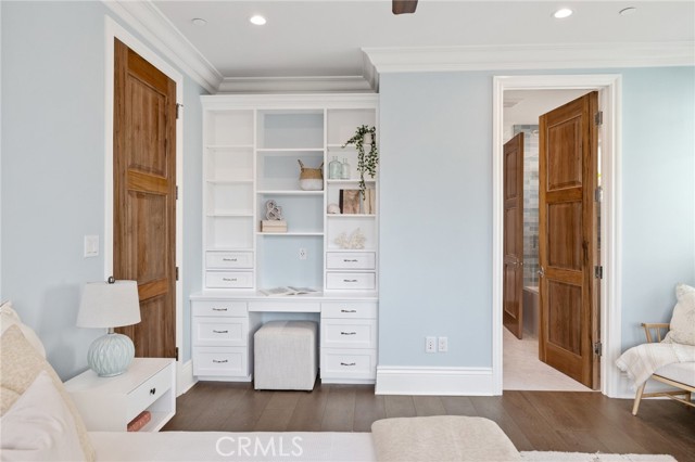 Bedroom with Built-in Desk and Display Shelving