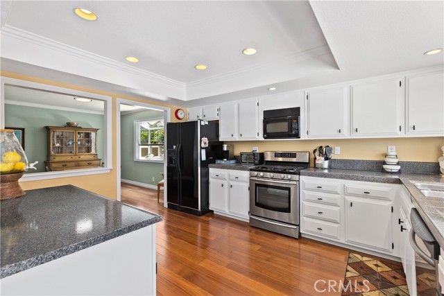 Kitchen has ample space for creating your culinary dreams. Freshly painted cabinets and updated counter tops.