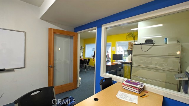West room looking East towards office and entrance