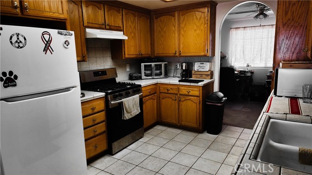 Kitchen looking at stove area.