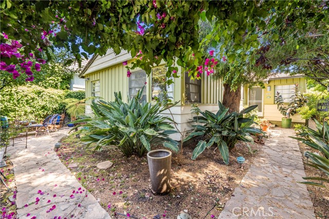 This Mid-Century duplex is situated in an A+ location of Venice! 1805–1807 Shell Ave is just a few blocks away from the iconic Abbot Kinney Boulevard, a known destination for top-chef eateries, local artists, and many boutique shops to enjoy.
This private oasis is beautifully landscaped, has mature trees, birds-of-paradise, concrete pavers, and several private seating areas. 1805 Shell offers two bedrooms and two baths with French Doors opening out to a spacious patio. 1807 Shell is a one bedroom, one bath with its own outdoor seating area. Both units are a blend of open interiors with kitchen bay windows and hardwood floors. This property is well built with a craftsman's sense of design coming to mind when taking in the period architecture or walking the shared pathways beneath the mature trees and lush landscape.
The detached two-car garage is a great opportunity for a possible ADU conversion - offering maximum upside to owner-occupants, investors, and developers alike.