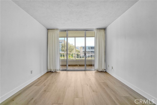 Bedroom with Balcony access.