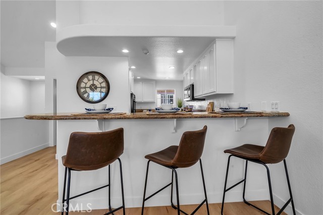 Breakfast bar at granite counter top