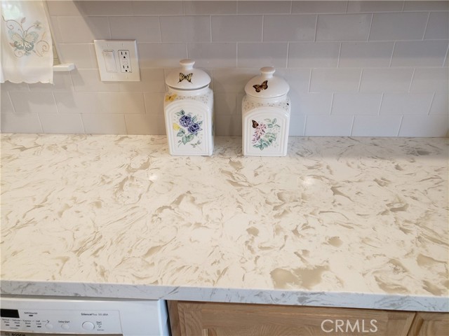 New corian countertops in kitchen.