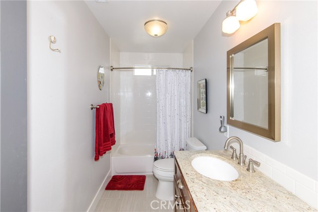 Master bath with tiled tub/shower combination!