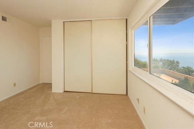 Third bedroom on the lower level - en suite and Catalina views.