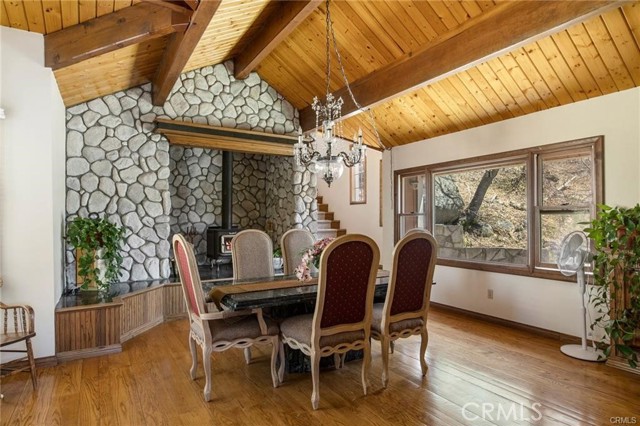 Main House:Family room with wood burning stove or now used as a private dining area.