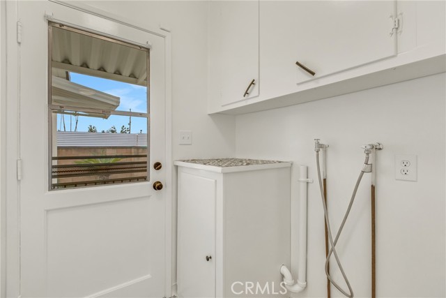 Laundry room with storage