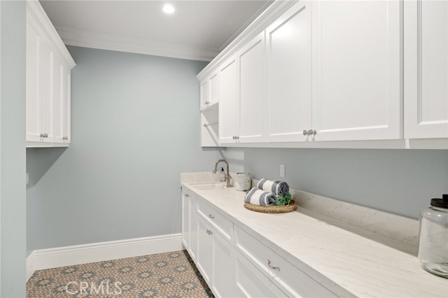 Spacious Laundry Room with Utility Sink