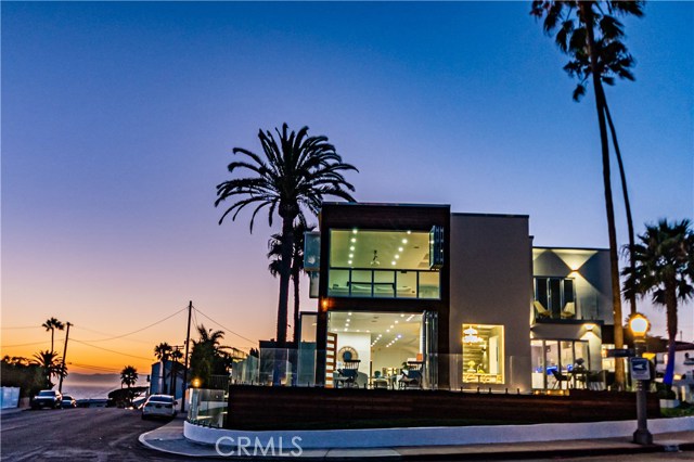 227 Waterview Avenue Playa del Rey, California MODERN SEASIDE ESTATE, TWO BLOCKS FROM THE BEACH! Truly the "king of the hill," this architectural gem features panoramic ocean views from Palos Verdes to Malibu. Newly remodeled and recently upgraded, this home doesn't just have "wow factors," it IS a "wow factor." Dramatic floor to ceiling glass accordion doors and windows throughout provides the best indoor/outdoor living space in Playa Del Rey. The backyard oasis features 3 pools including a 50-person hot tub, one of the largest in LA, from which you can watch the sun sink into the ocean. Continue the entertaining on the roof-top deck with striking views and plenty of space to relax, meditate, or gather.
OVER 4,600 SQFT of living space built on a 9,200 SQ FT double corner lot makes this the perfect place to work or play from home. The spacious floor plan features 4BR and 4BA, including two premium suites and a detached game room/gym adjacent to the pools. The chef's kitchen features a 60” Viking stove, pull out dishwashers and freezers, a wine fridge and commercial grade refrigerator; enjoy your meals on one of the many ocean view decks. Multiple office spaces throughout the property provide the opportunity for more than one person to work from home in a quiet environment. Details throughout include modern Toto bathroom appointments, a meditation tub, exotic wood accents, imported tile, indoor/outdoor sound system, connected home nucleus system, heated floors, fire pits, vegetable garden and high-end security system.