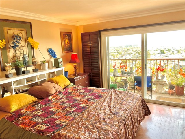 Full-sized wooden shutters provide privacy and shade.