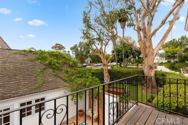 MASTER BEDROOM BALCONY VIEW ONTO COURTYARD AND FRONT YARD SPACE