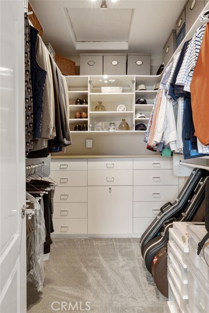 Walk-in closet with built-in storage system.