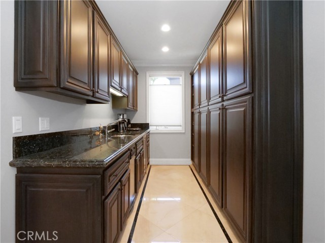 butler's pantry with sink, wine cooler and T/C