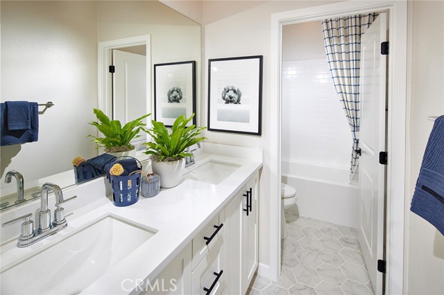 Subject Property is under construction, this is the Ellis Plan 3 model home and not subject property.