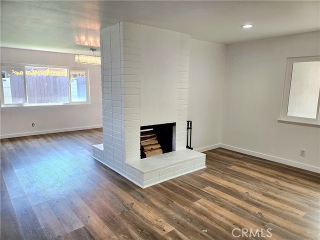 view of double sided fireplace from the living room