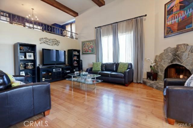 Living Room with Expansive 16.5 foot High Ceilings and gas fireplace